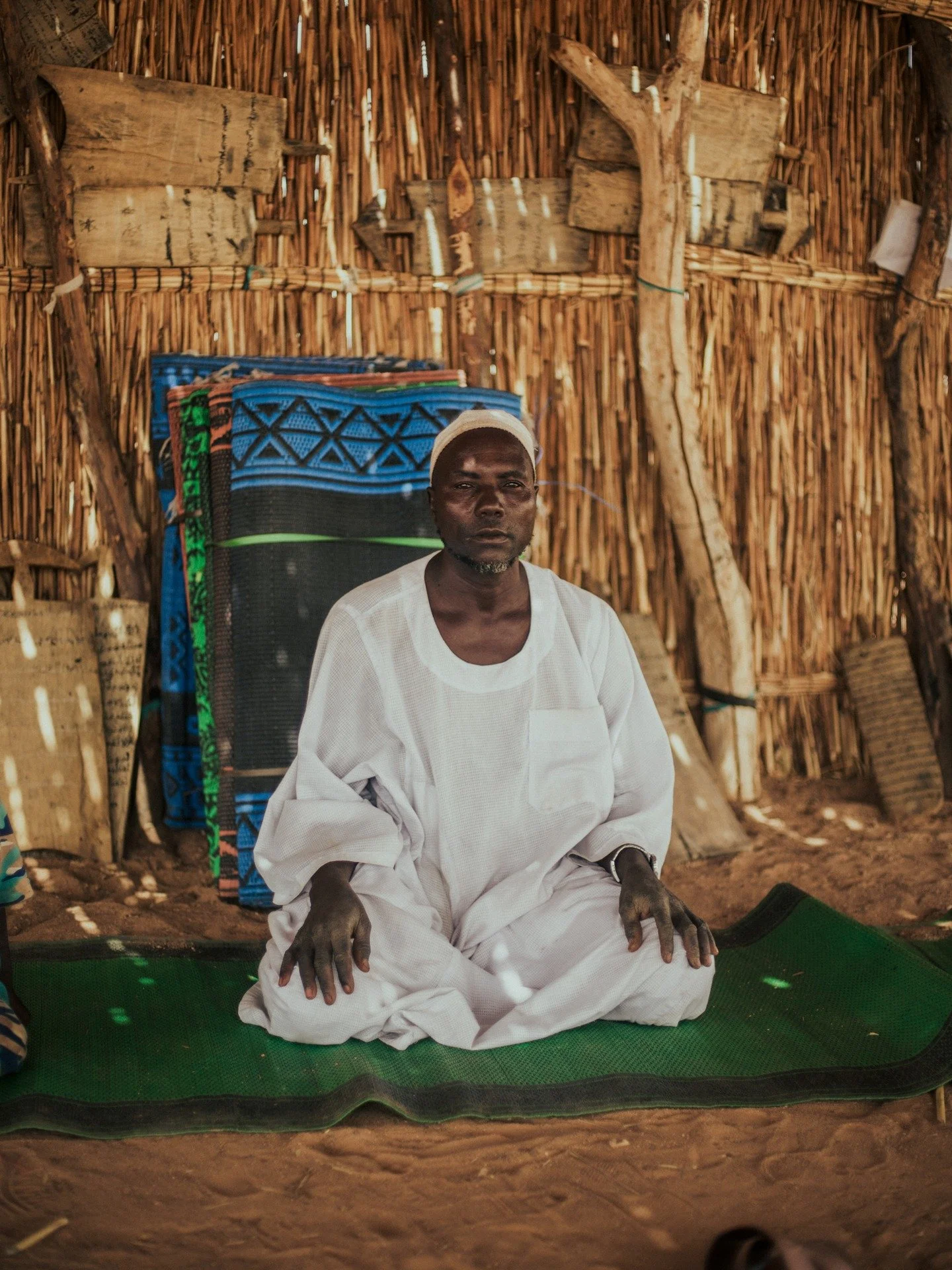 The precarious exile of Sudanese refugees in Chad, 2024.

--

The Imam of the improvised mosque in the Farchana refugee camp.

The Farchana refugee camp in Tchad hosts refugees fleeing fights in Sudan between the Rapid Support Forces (RSF) and the SA
