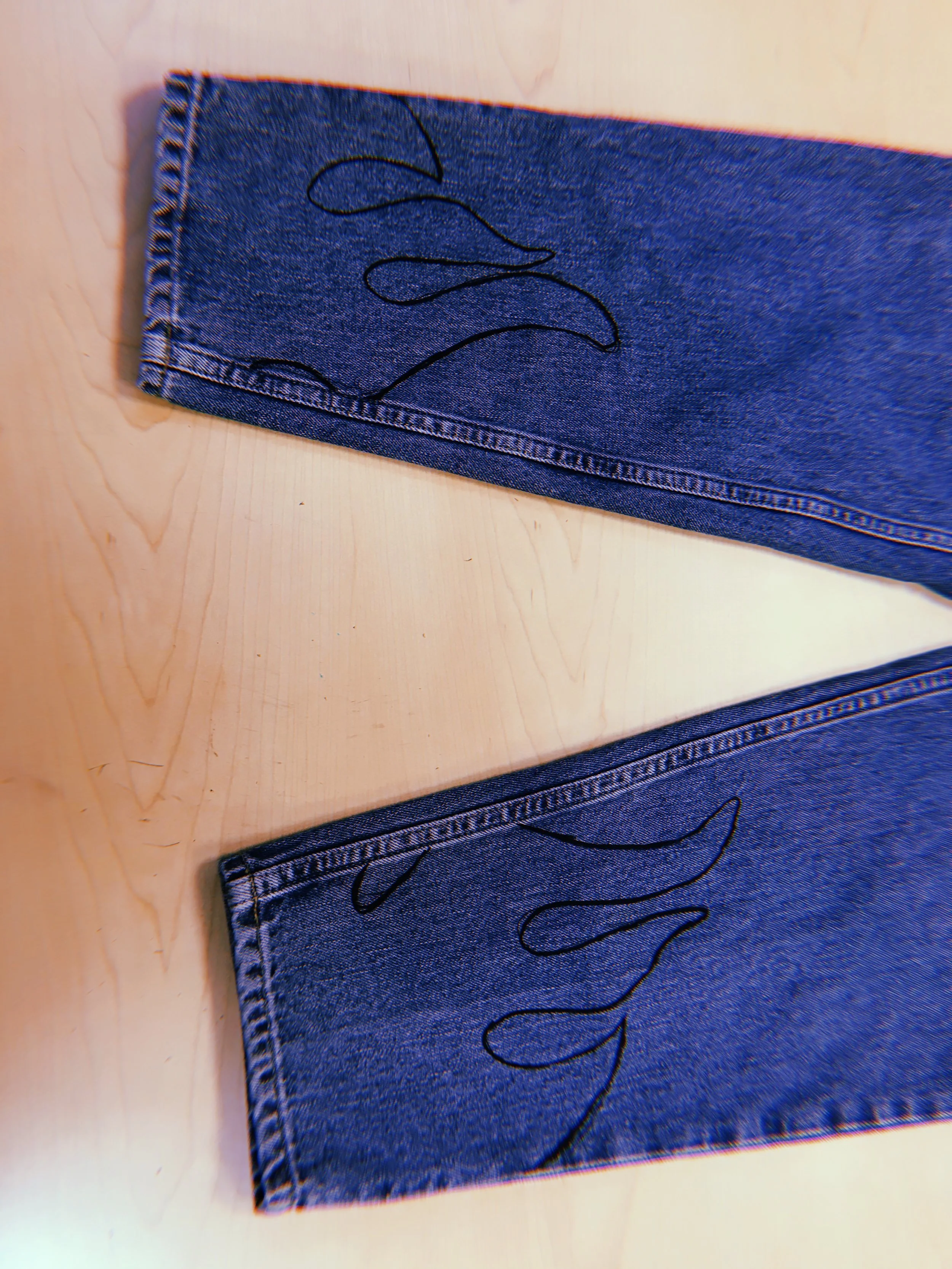 painted flames on jeans