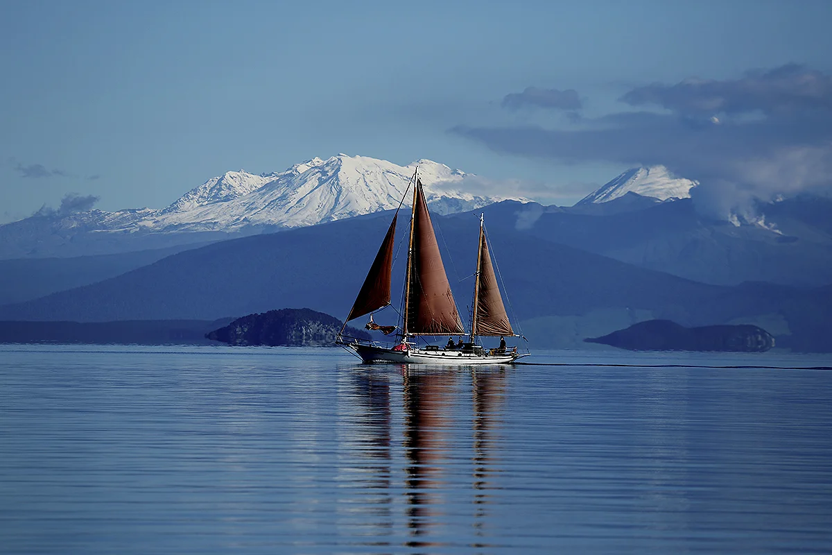 Sailing Lake Taupo with mountains in background.jpg