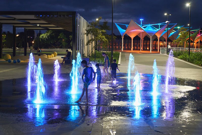 kids-enjoying-water-play-at-night.jpeg