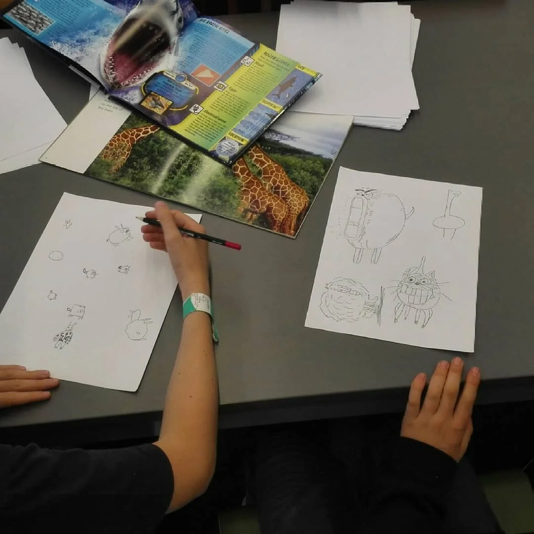 Working on character design using old school picture reference - books!
