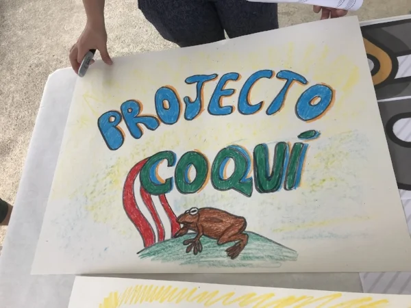 One of the classes in the school pitched in to create a beautiful sign for Project Coqui.