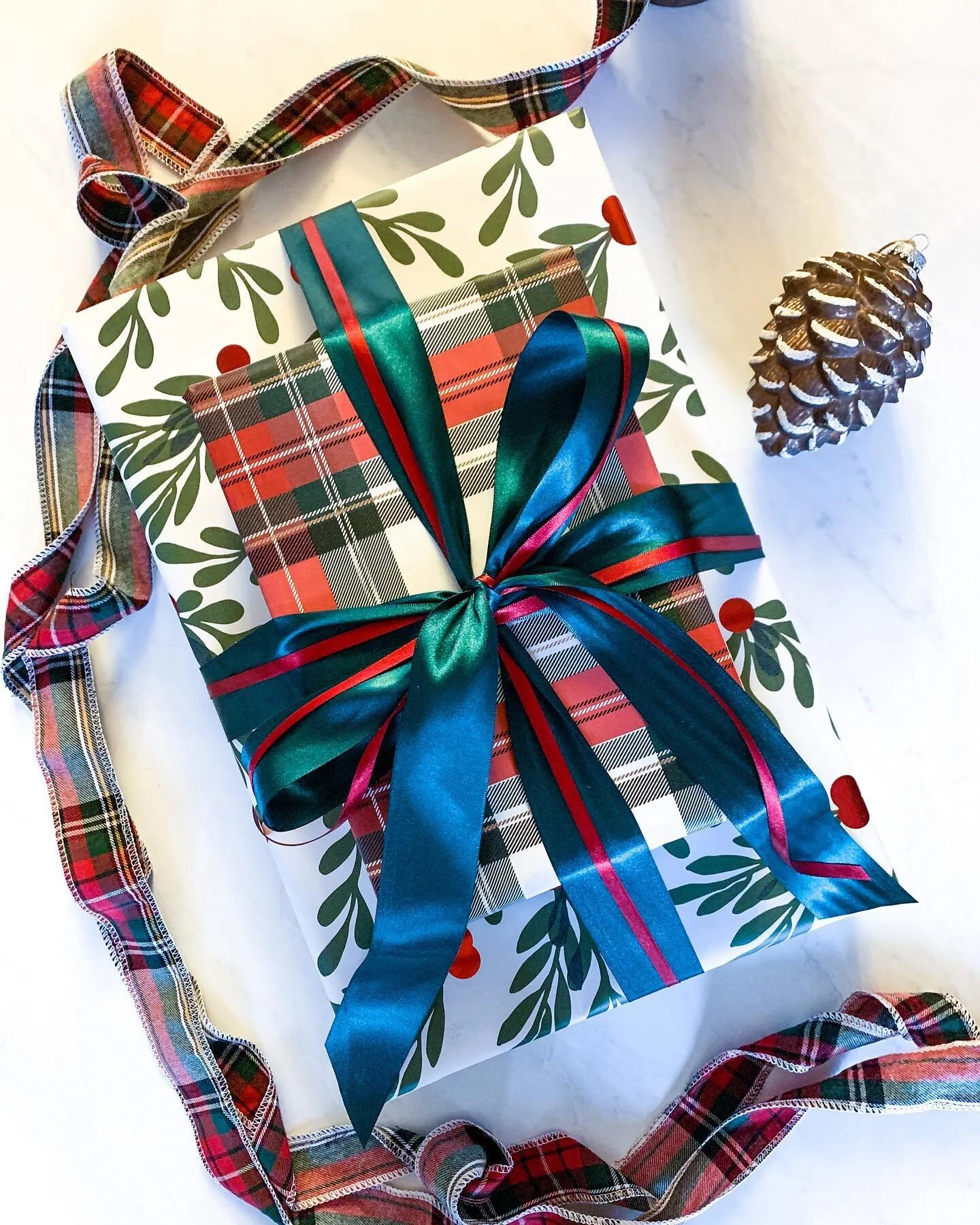 Glamour shots by Deb 💫 Just kidding, I staged this. 

What kind of paper are you using this year?! For my Christmas wrap story I went with a plaid and holly berry stone paper mix brought to you by Paper Source. 

On deck for 2021, ways to get creati