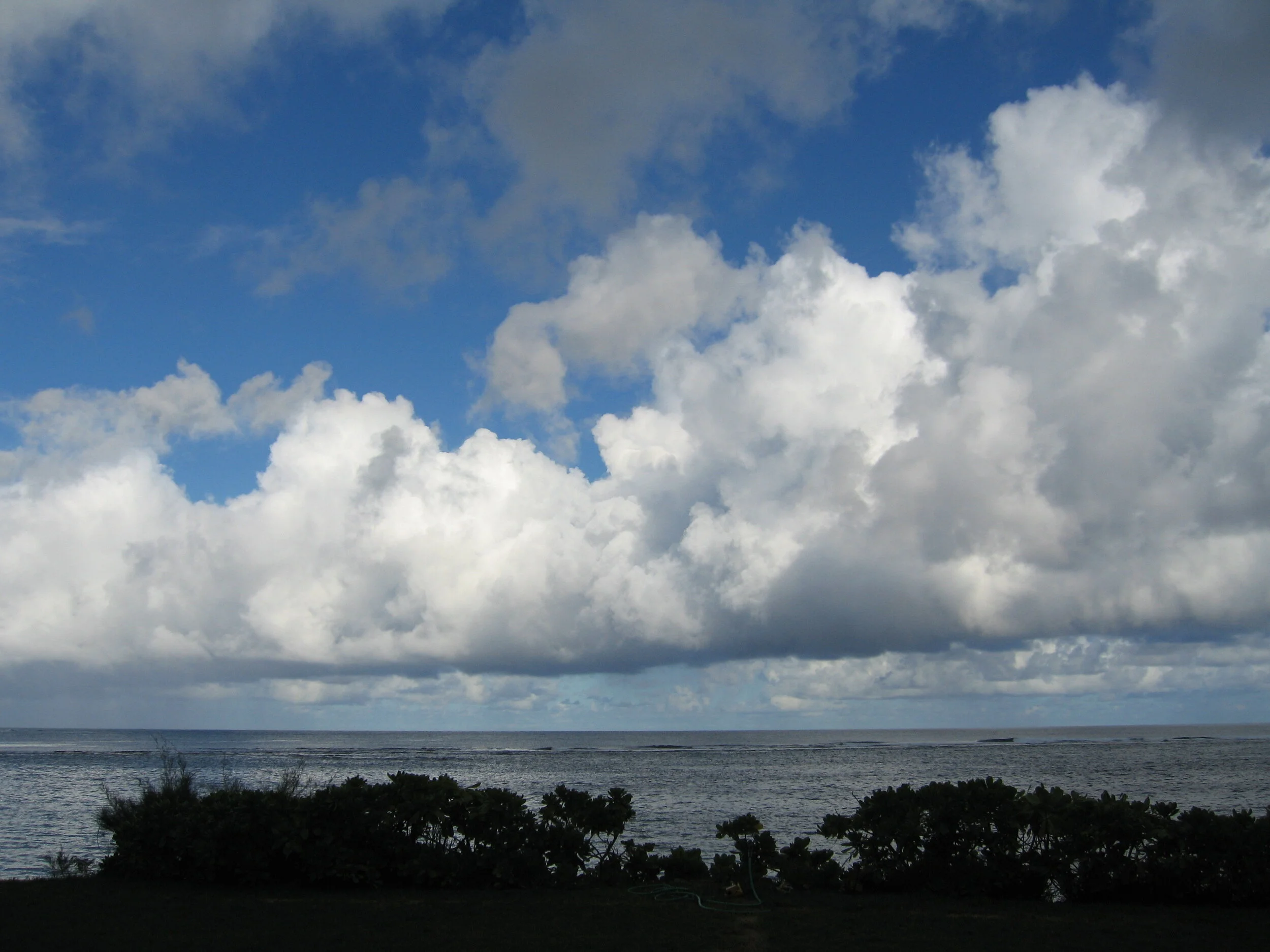 Low Puffy Clouds over Tunnels by Connie Hunt Photography