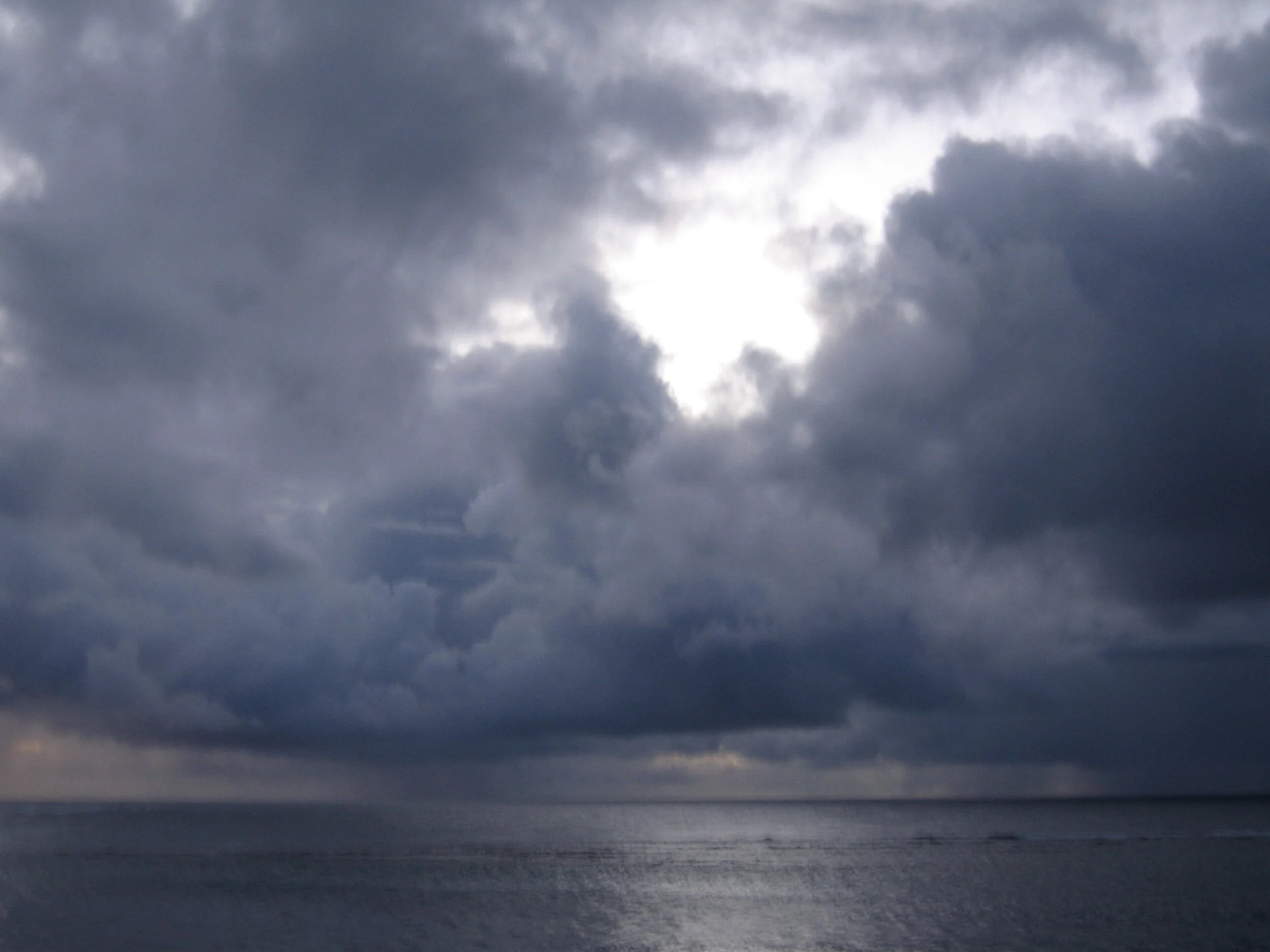 Puffy Clouds in a Dark Sky by Connie Hunt