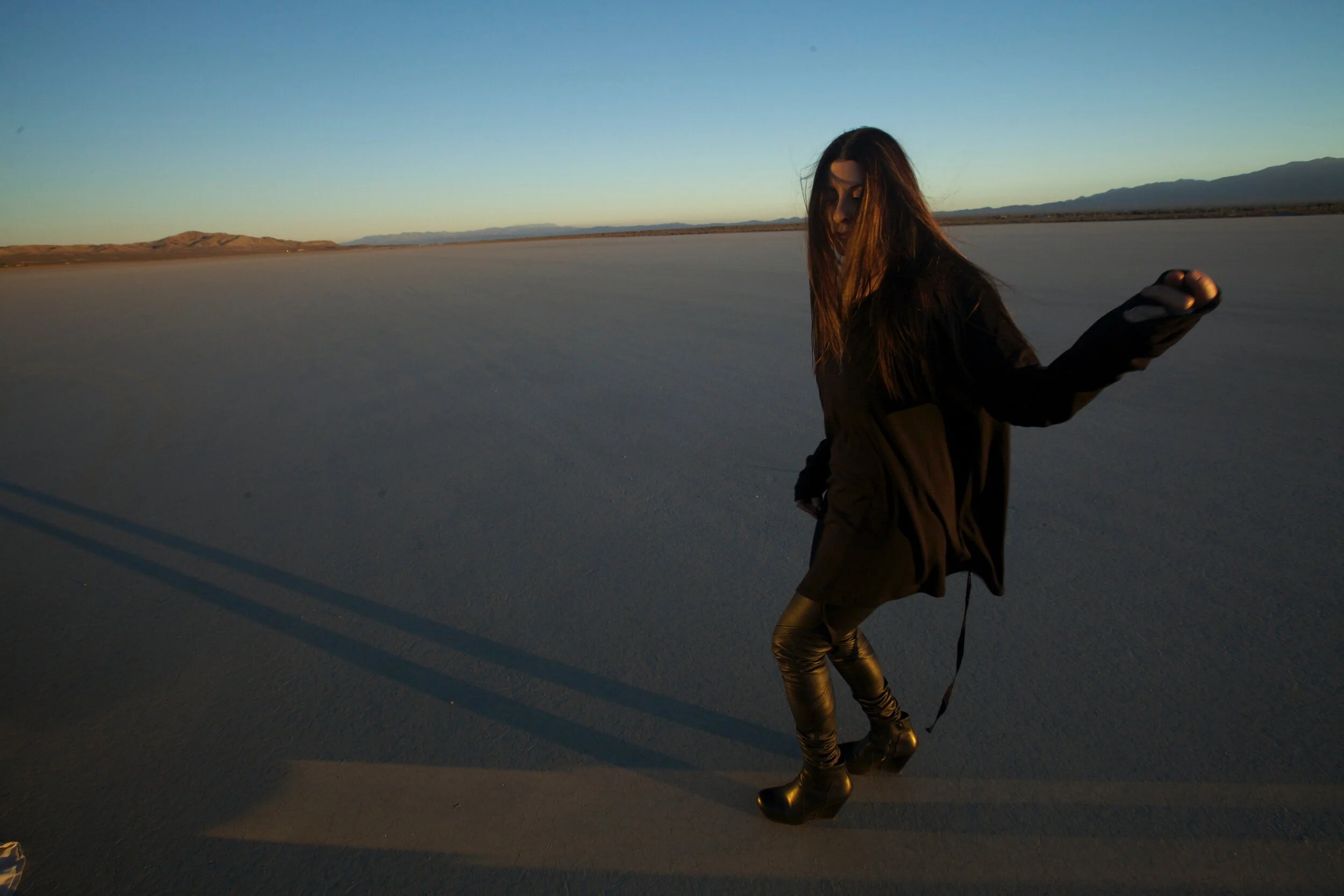 Connie Hunt Air Guitar in the Desert 1 by Jim Shea