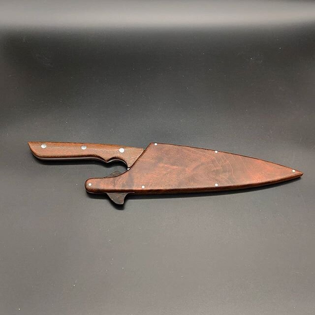 So a coworker came up to me and asked if I could make a saya on an older knife. So I gave it a shot and it turned out pretty good with my little locking switch. The wood is Ipe to match the handle. And the lock is Wenge.  #bladesmithing #bladesmith  