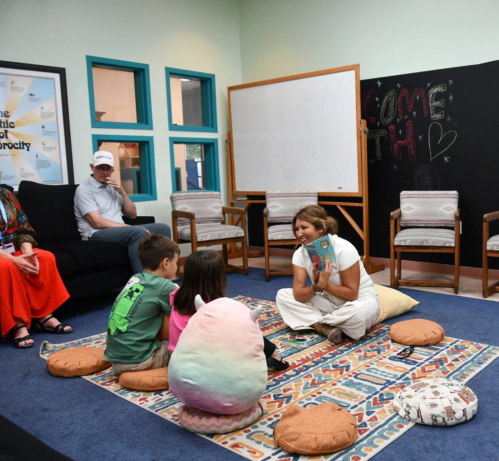 Author Nancy Abruzzo reading from her book  "Soft Bright Fluffy," introducing young readers to the wonders of the many balloons that fill the New Mexico skies.