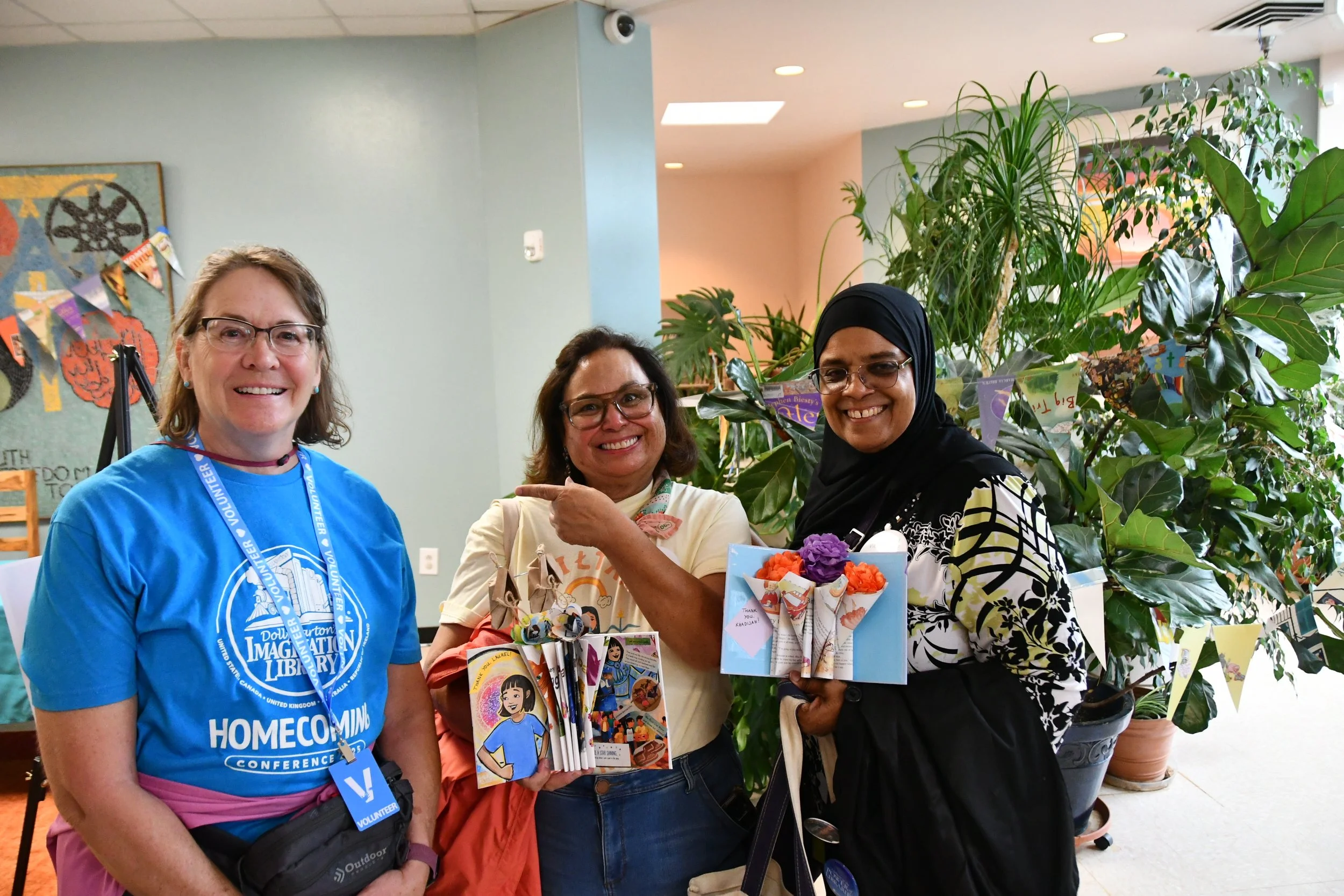 From left to right:  Libros Volunteer Mary Beth Thorn, author Laurel Goodluck, and author Khadijah VanBrakle.