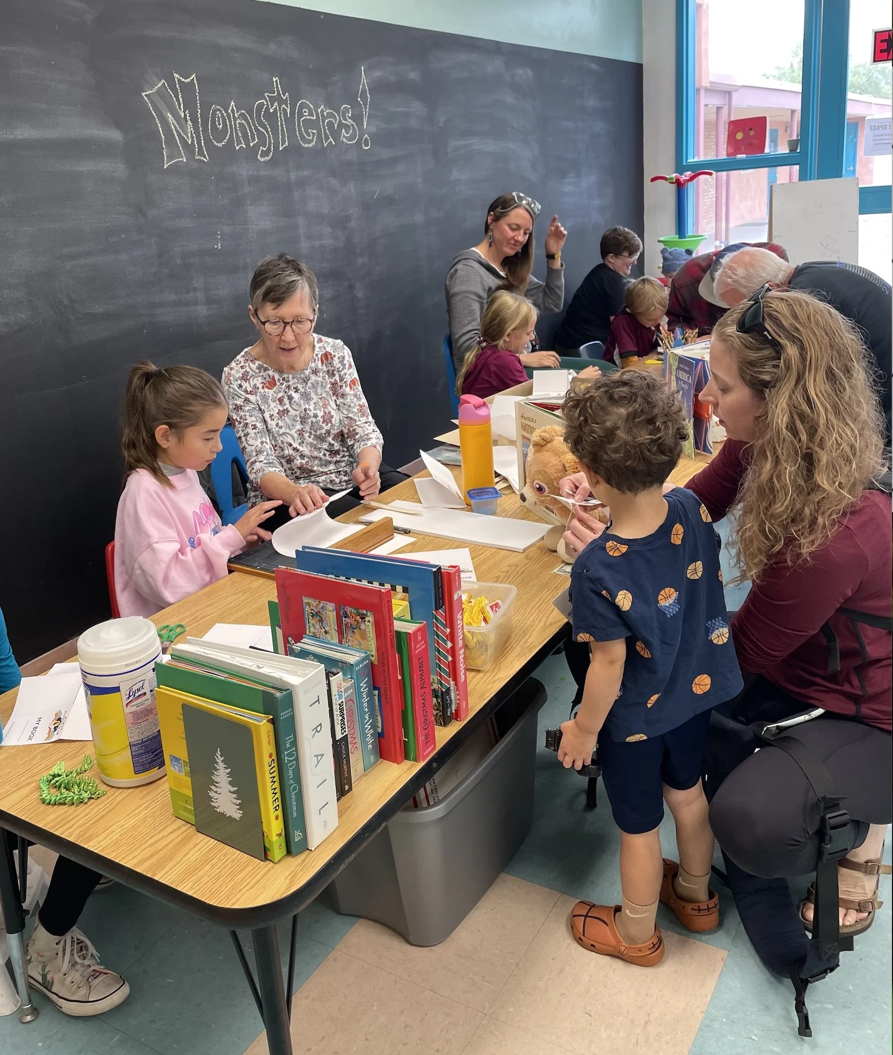 Children hard at work on art activities at the New Mexico Children’s Book Fair.