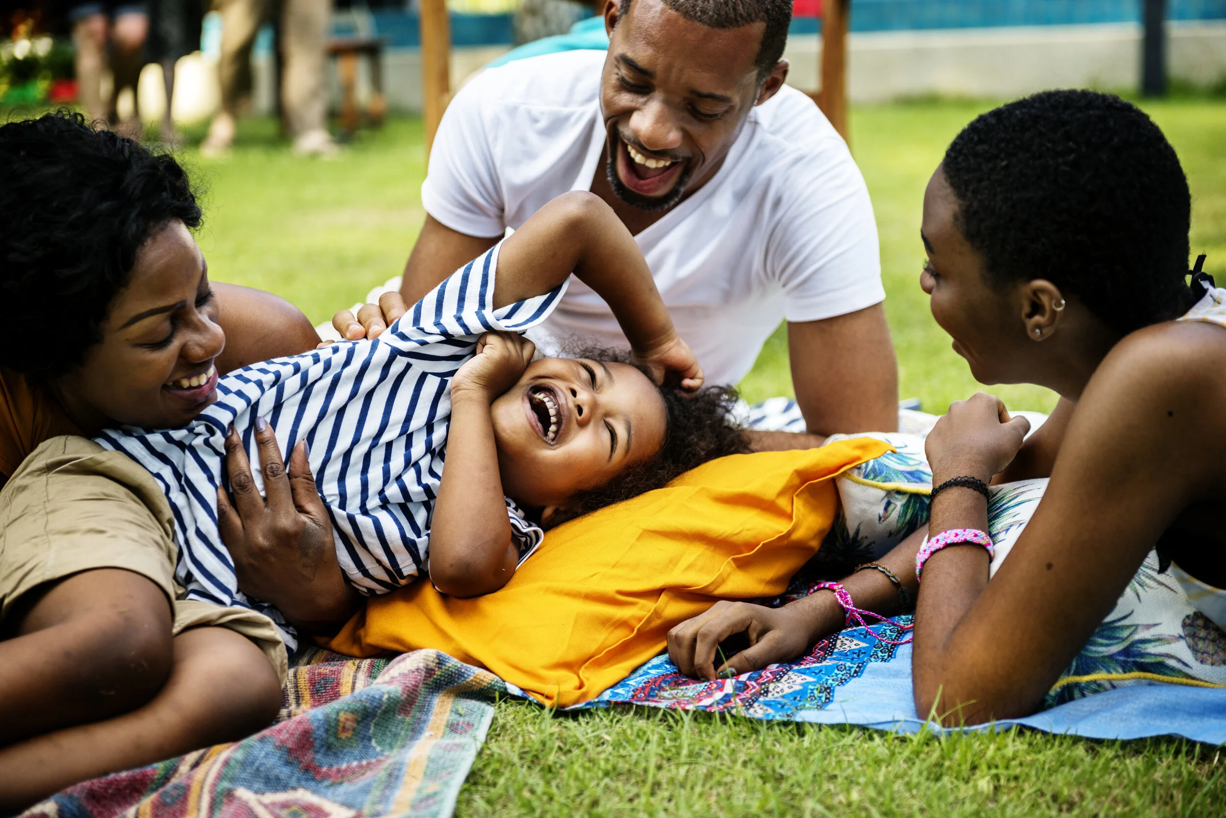 black-family-enjoying-summer-together-backyard.jpg