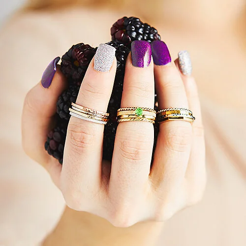 Nail polish color correction, cuticle &amp; dry skin removed, yellow shadows white balanced, contrast adjustment on rings, color enhanced on green gem stone. Cropped in slightly to focus more on the rings/product.
