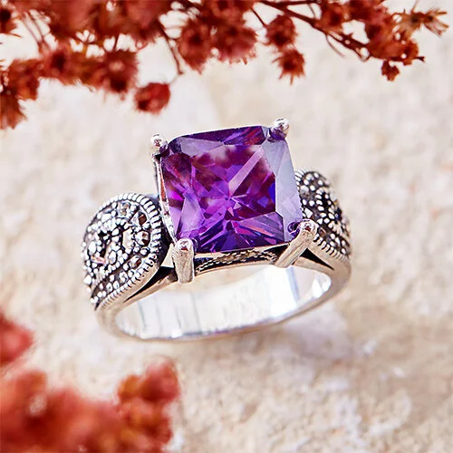 Putty removed, stone rebuilt, and cast &amp; contact shadow rebuilt. Fingerprint on gemstone cleaned up and light color replaced highlights. Brightness/contrast and saturation adjusted.