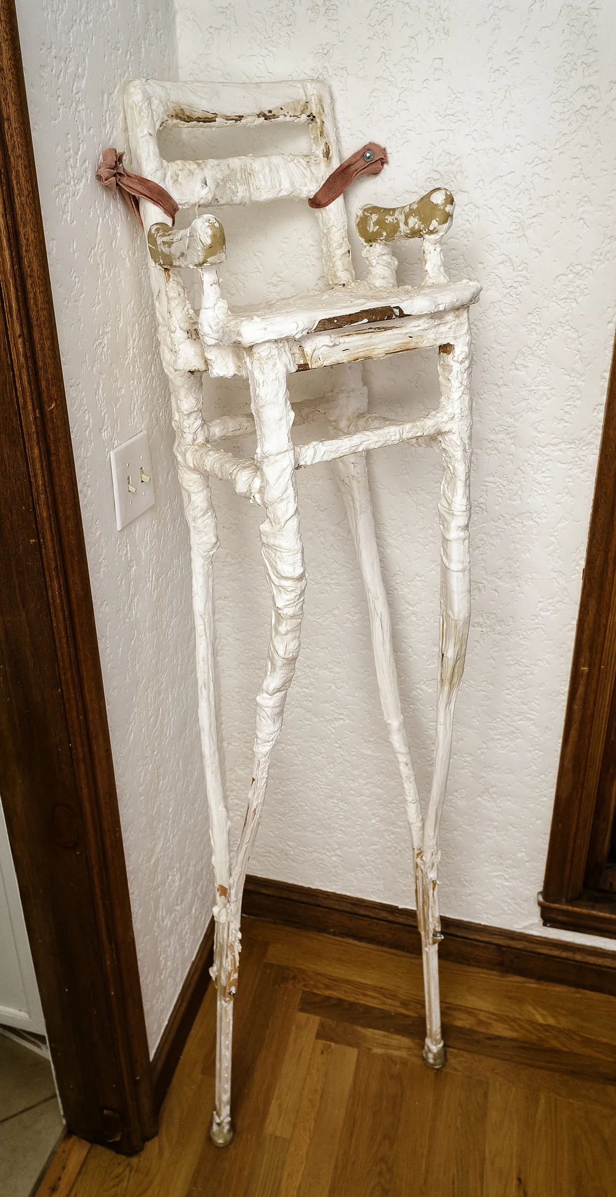 sitting pretty wood, plaster and found objects 14"w x 70"h x 16"d 6,000.00