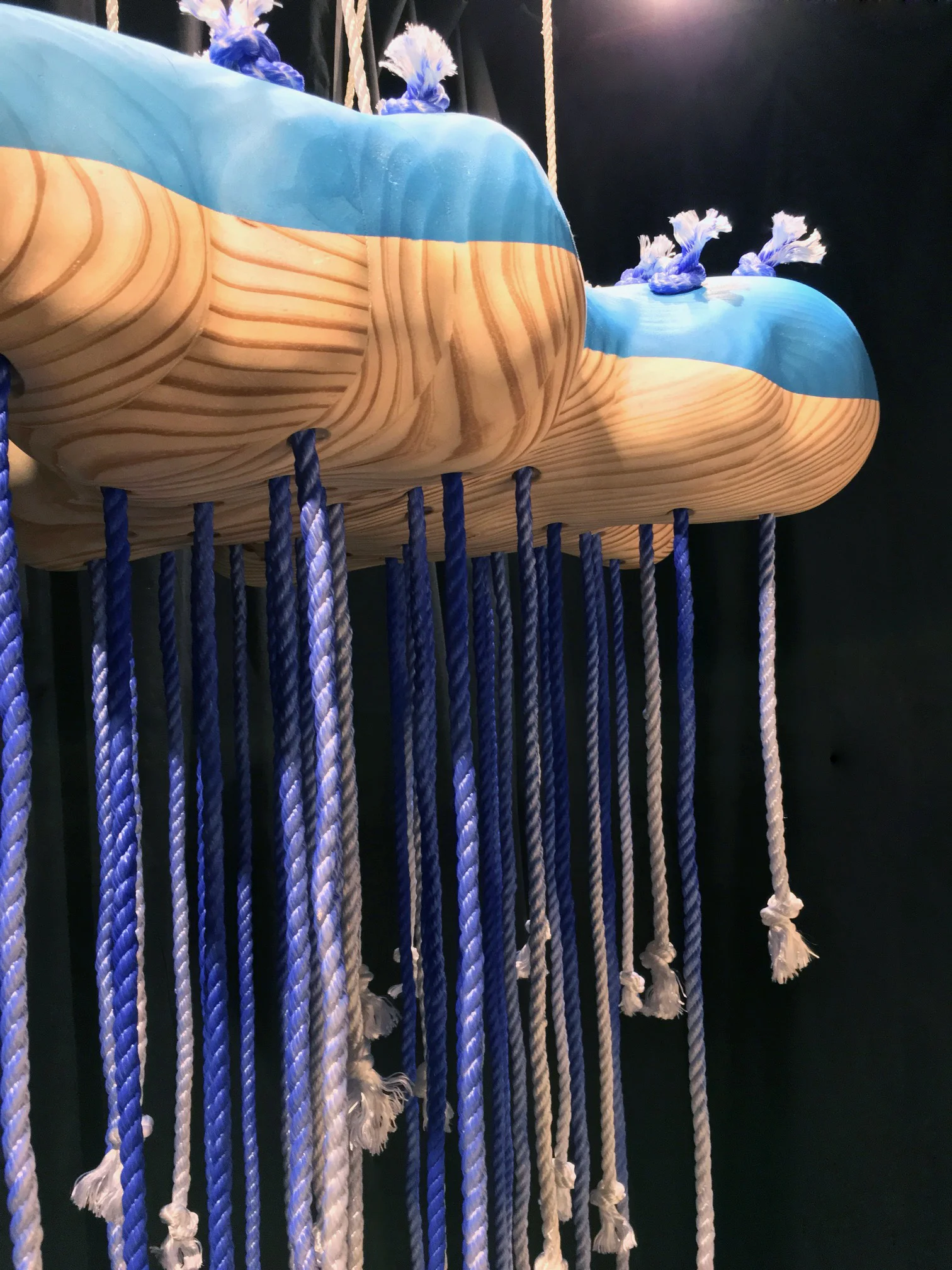 Rain Cloud , Pine, nylon rope, and spray paint, 4’x33”x23,” 2017.