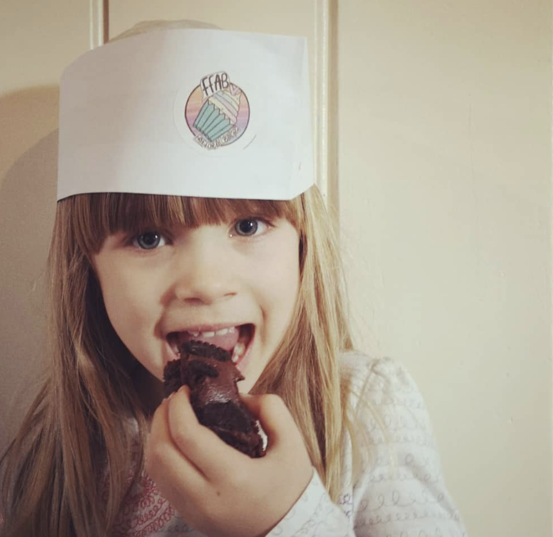 Amalia enjoying some allergy friendly baking. Picture: Instagram @freefromfarm