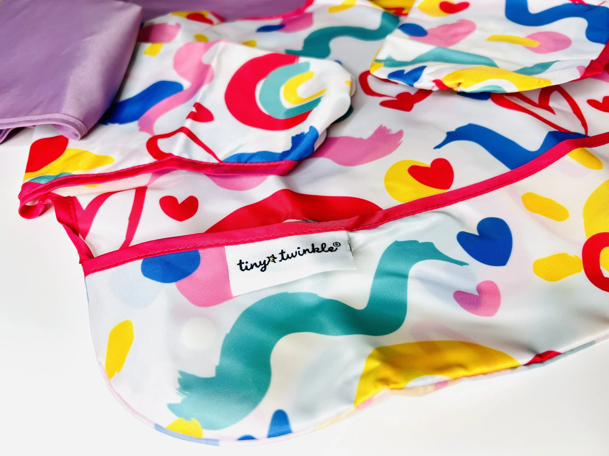 A Close-Up Look At Tiny Twinkle Bibs