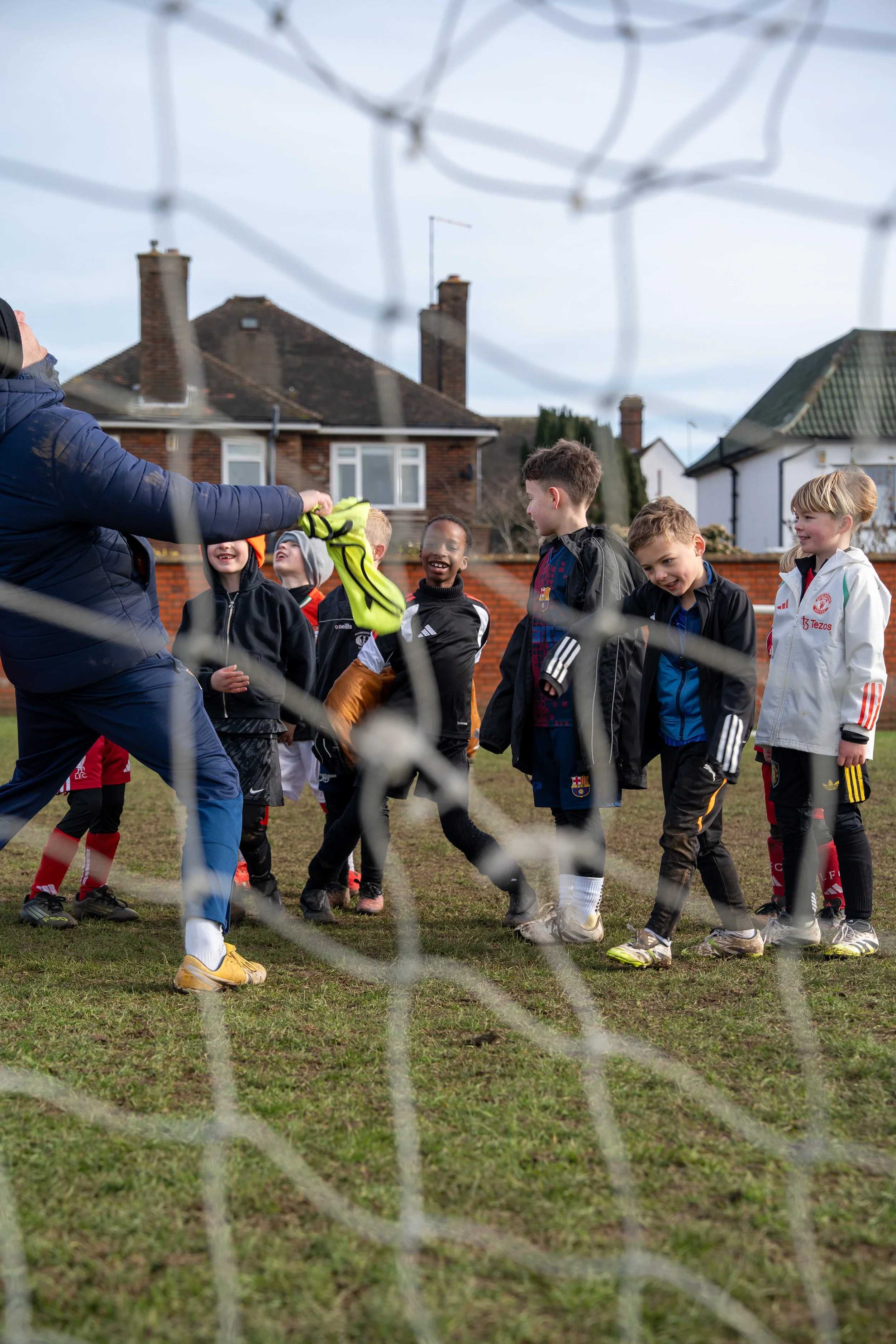Players laughing through net.jpg