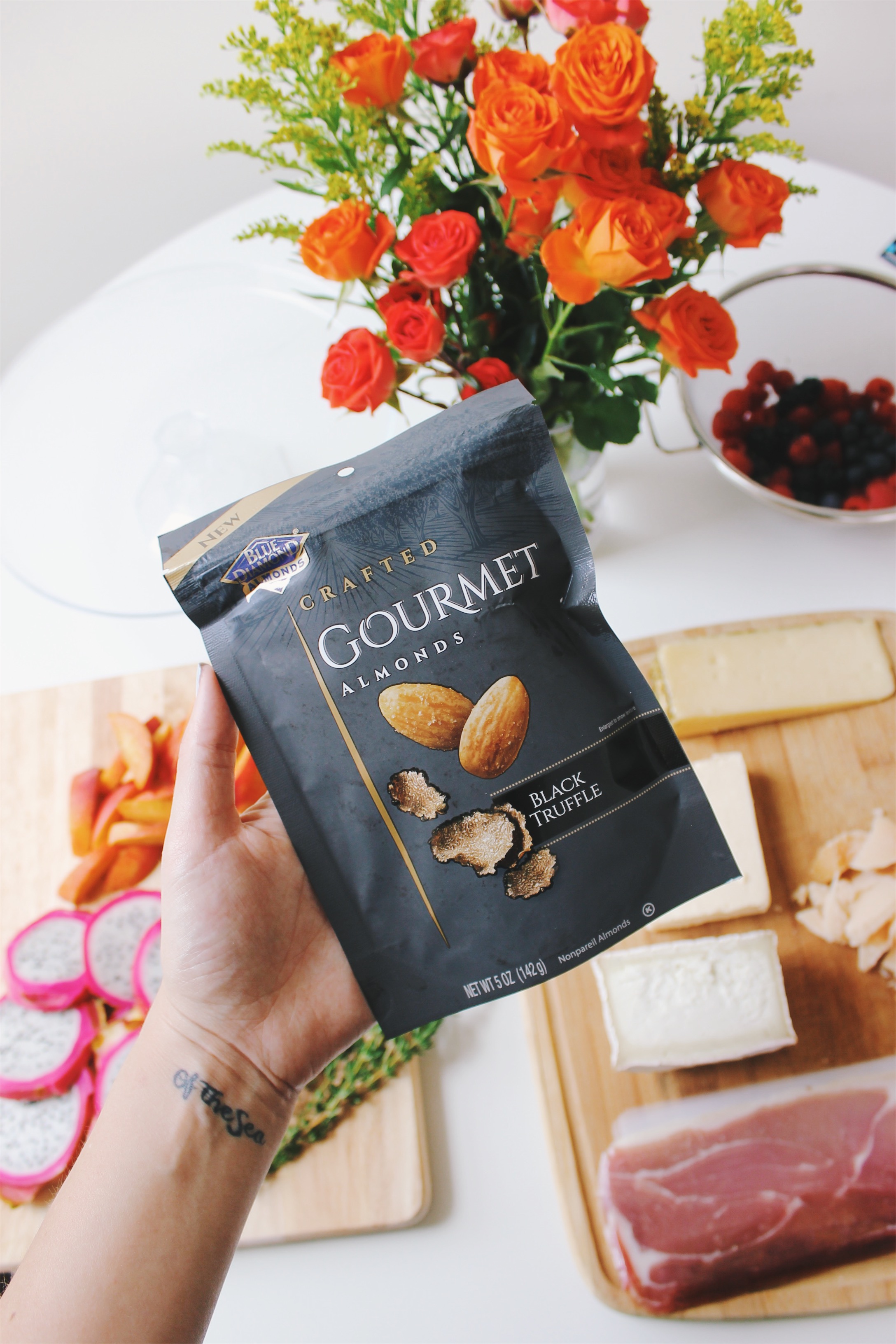 The ingredients for That Cheese Plate, featuring Blue Diamond Black Truffle Almonds