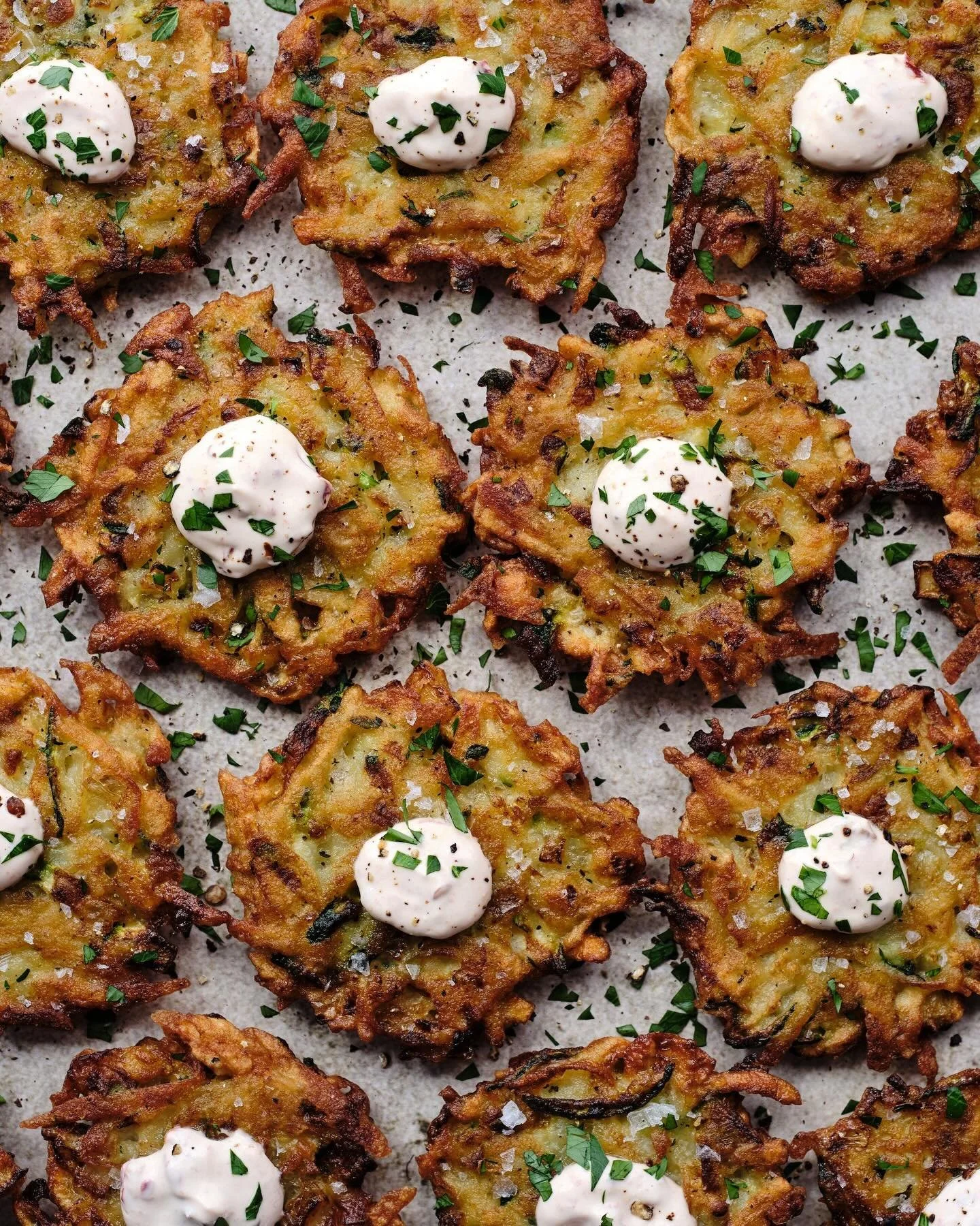 CRISPY POTATO &amp; ZUCCHINI LATKES with a smoky sour cream &amp; parsley ✨ This is one of my favorite recipes from I&rsquo;ll Bring the Apps and perfect for the holiday season! 

Comment POTATO and I&rsquo;ll message you the recipe before the book i
