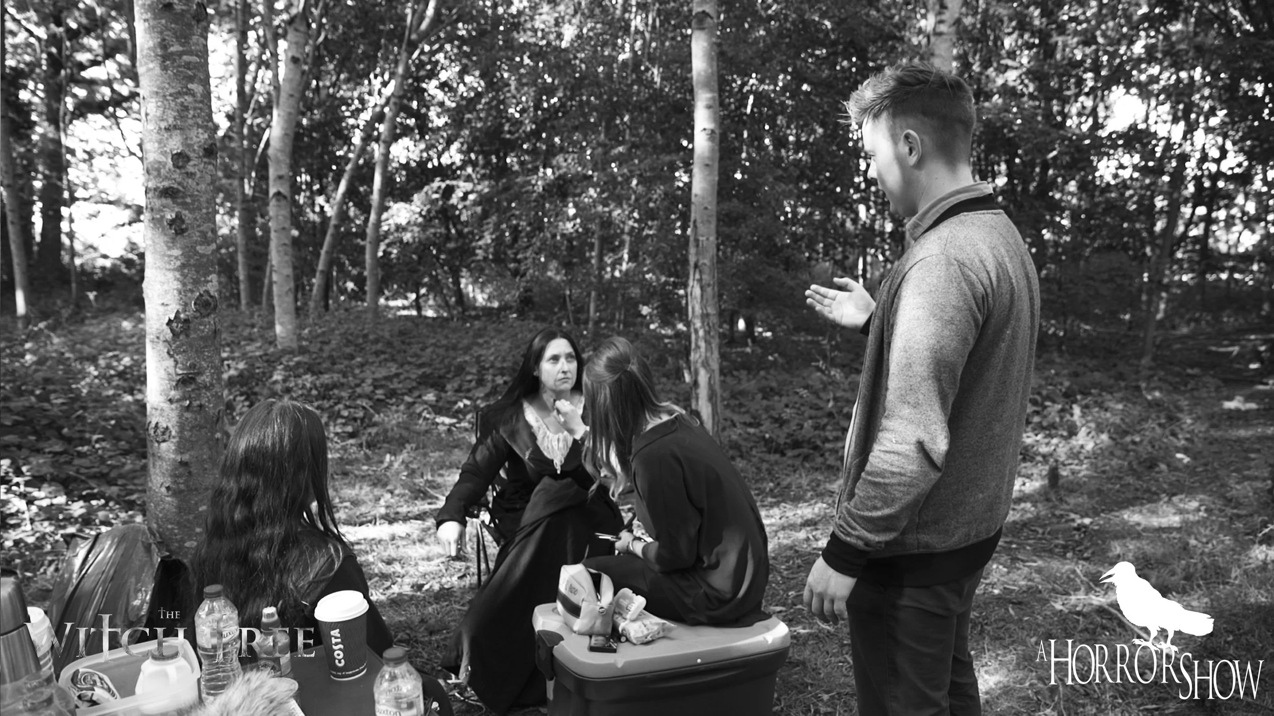 Director Lee Patrick Robinson chatting with Actors.