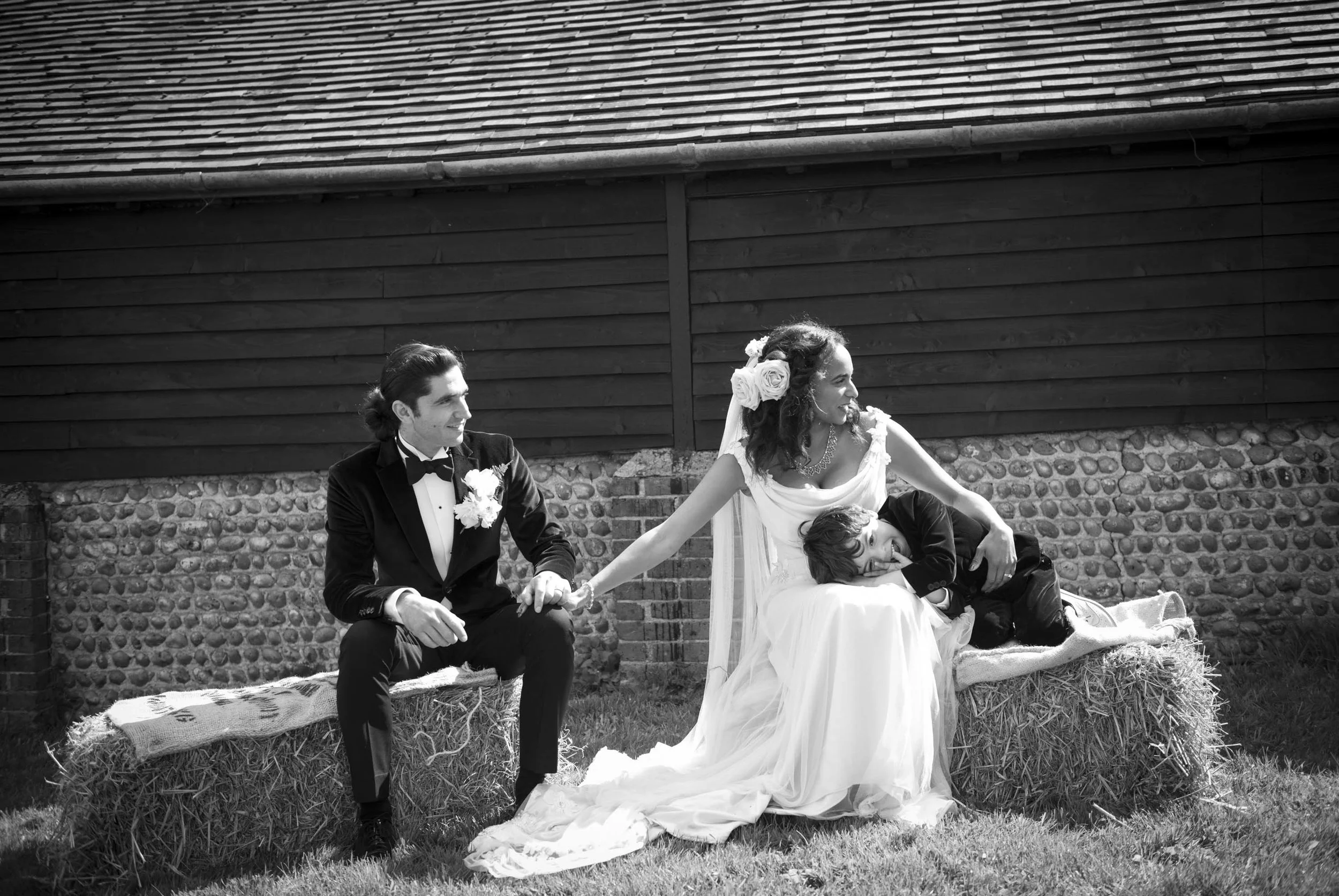 A Sussex Barn wedding with gorgeous original Art Deco touches created with heaps of creative passion... Fun, relaxed and rustic outdoor wedding photography in a Sussex barn. The sun shone on this lovely wedding between Jenny and Louis making for some truly beautiful photos.