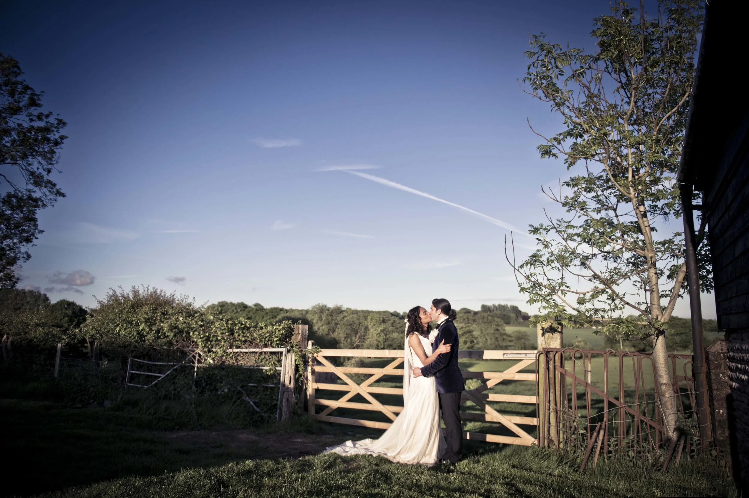 A Sussex Barn wedding with gorgeous original Art Deco touches created with heaps of creative passion... Fun, relaxed and rustic outdoor wedding photography in a Sussex barn. The sun shone on this lovely wedding between Jenny and Louis making for some truly beautiful photos.