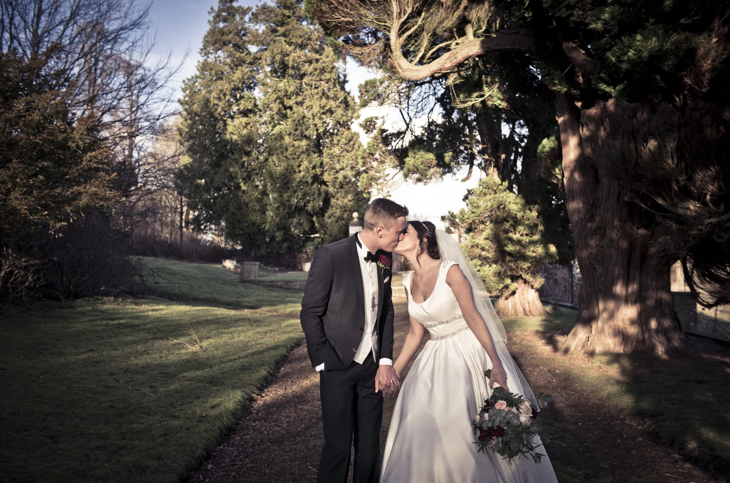 Bride and Groom Kissing Post Wedding Photography Sussex | Buxted Park Sussex Photography | Classic Elegant Wedding Photography Sussex