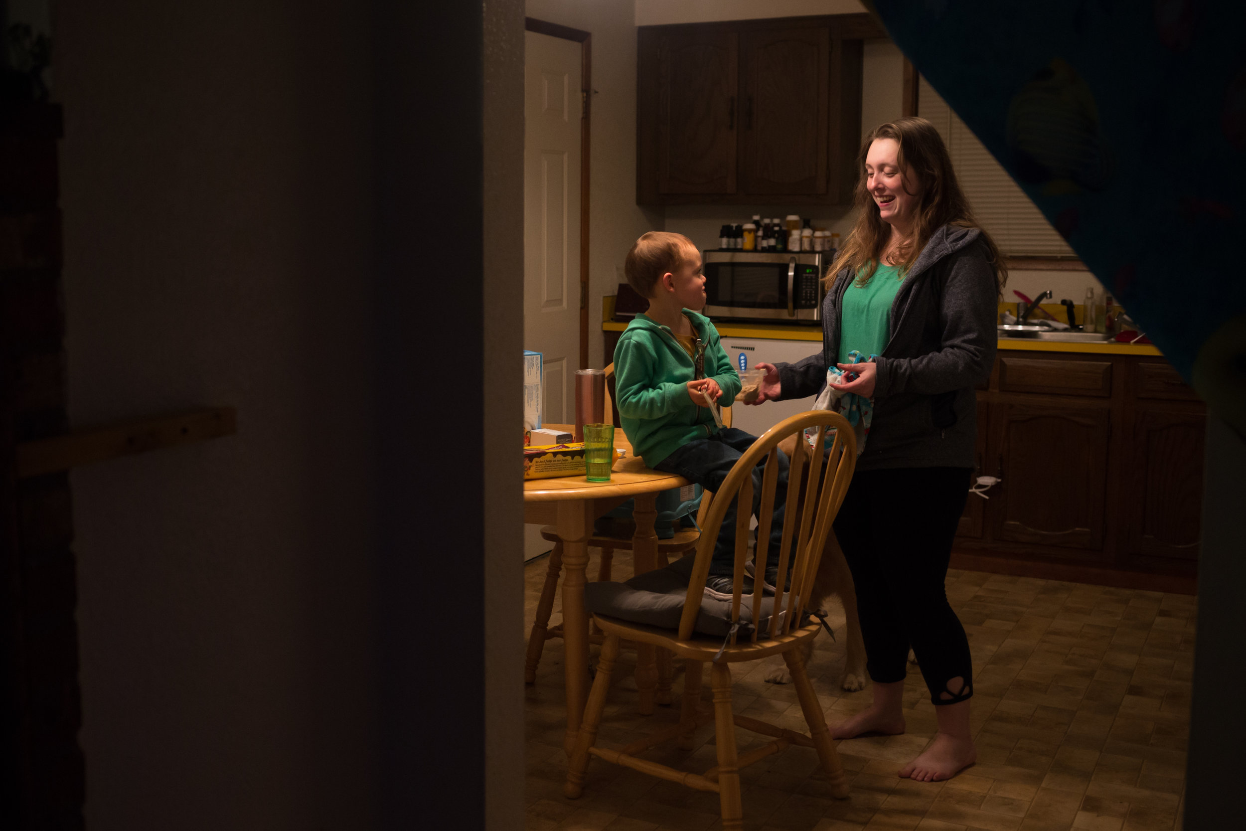  James and Paige enjoy dinner at their home in Springfield, Oregon. Paige, a single mom,&nbsp;works two jobs as a an inventory manager and production worker at a local warehouse to support her family.&nbsp; 