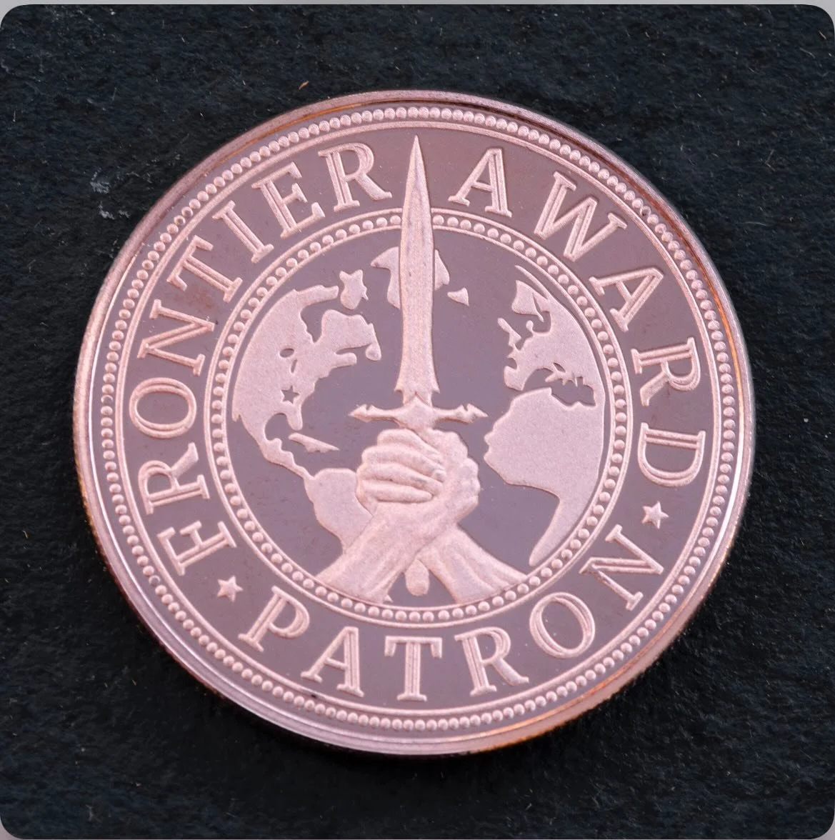We are gearing up for our next Frontier Award, a $1000 award to help bring a maker to the Atlanta Bladeshow in June, 2026.  The application period for makers will begin in January, so stay tuned. In the meantime, this 39mm pure copper coin designates