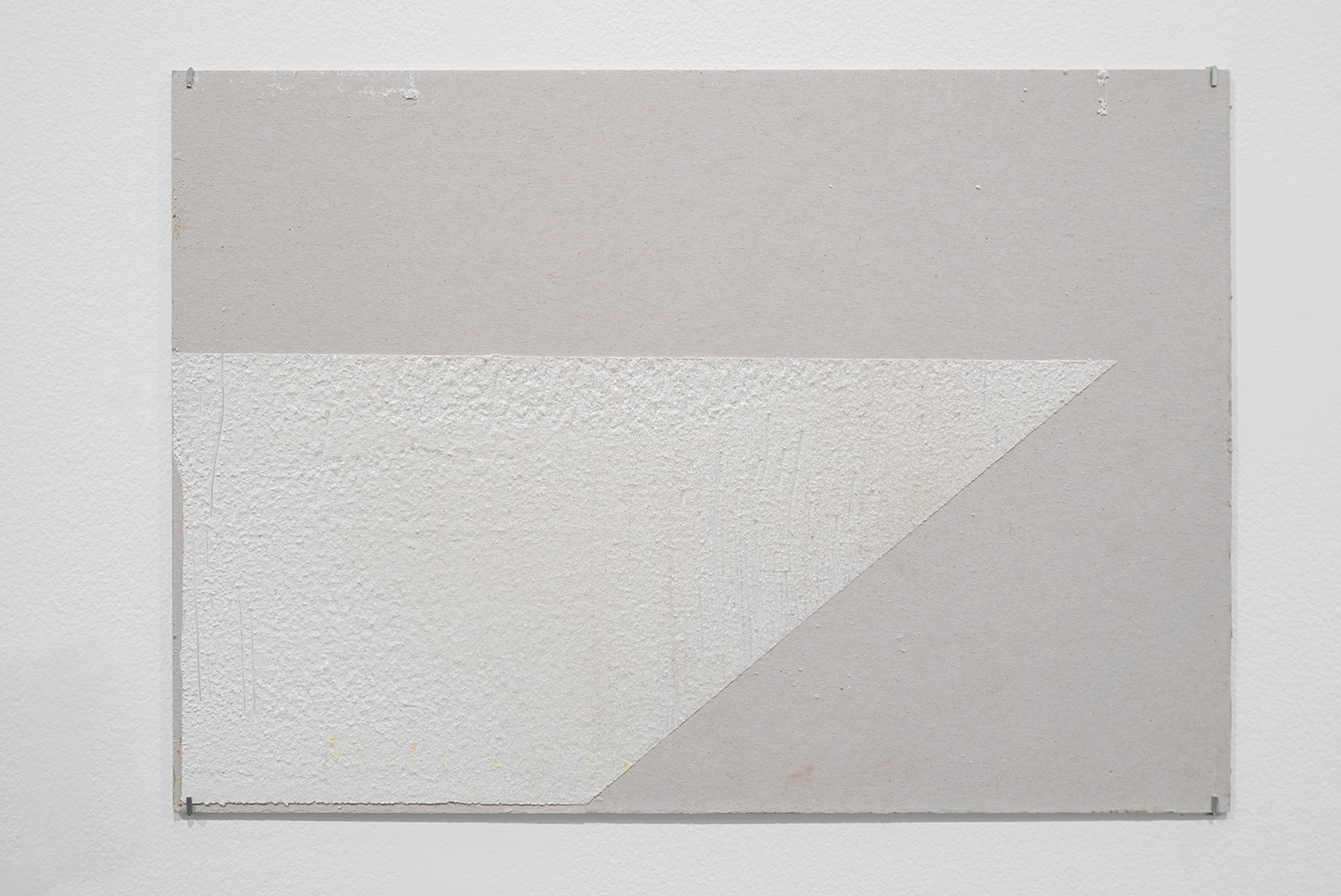   1000mm (section) (W), 1.5mm (T), White, left turn arrow (616), hand marking, remarking, D83  Jabal Ali-Lehbab Road , LP 230,  2017  Thermoplastic paint and reflective glass particles on grey board  35 x 50 cm 