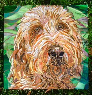 This is a stained glass portrait that Susan made of her other dog, Theo and then she wanted to do a pet portrait of Kodi.