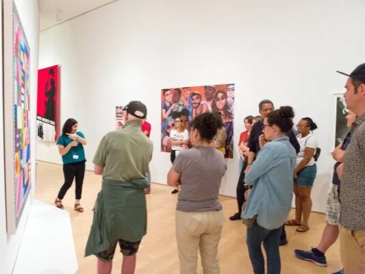 A teaching artist leads an ASL tour, 2019. (Photo: Conrado Johns)