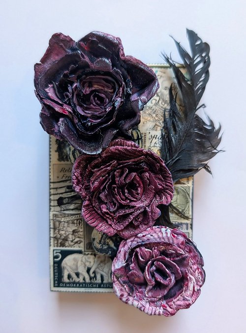   Emo  Cold wax on panel with vintage stamps and feathers 4" x 6"   Sold 