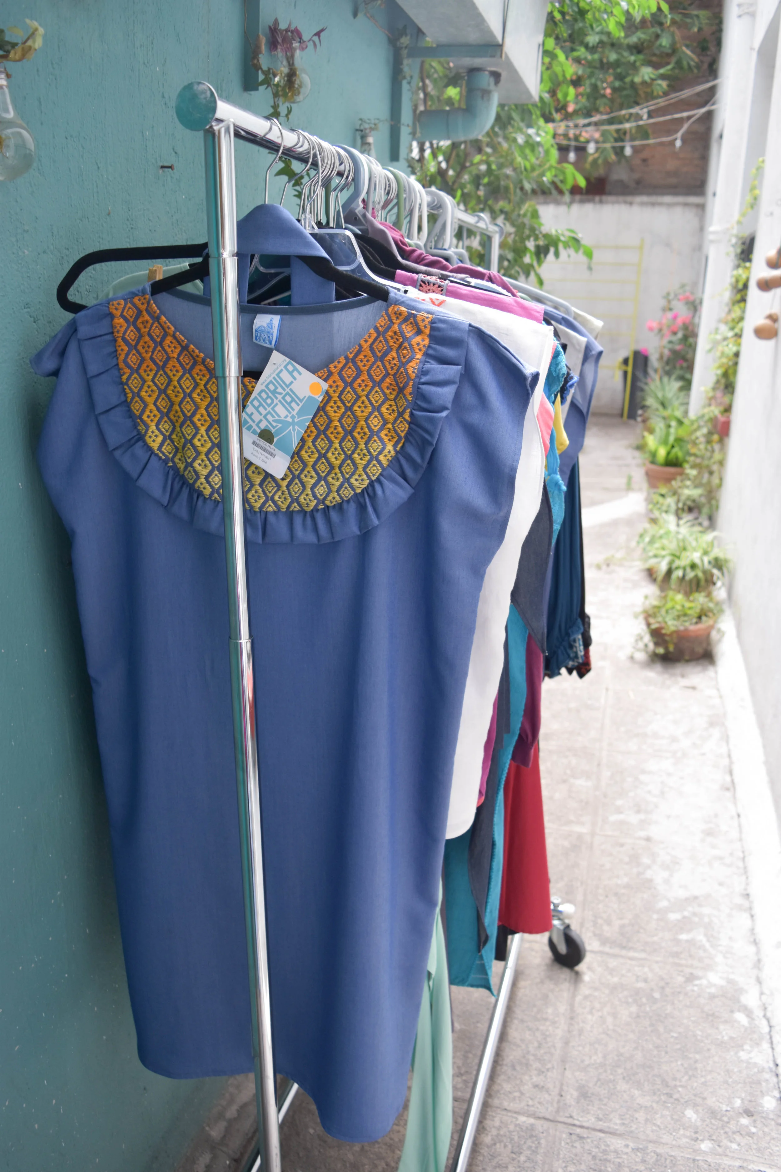 Racks and racks of handmade dresses.