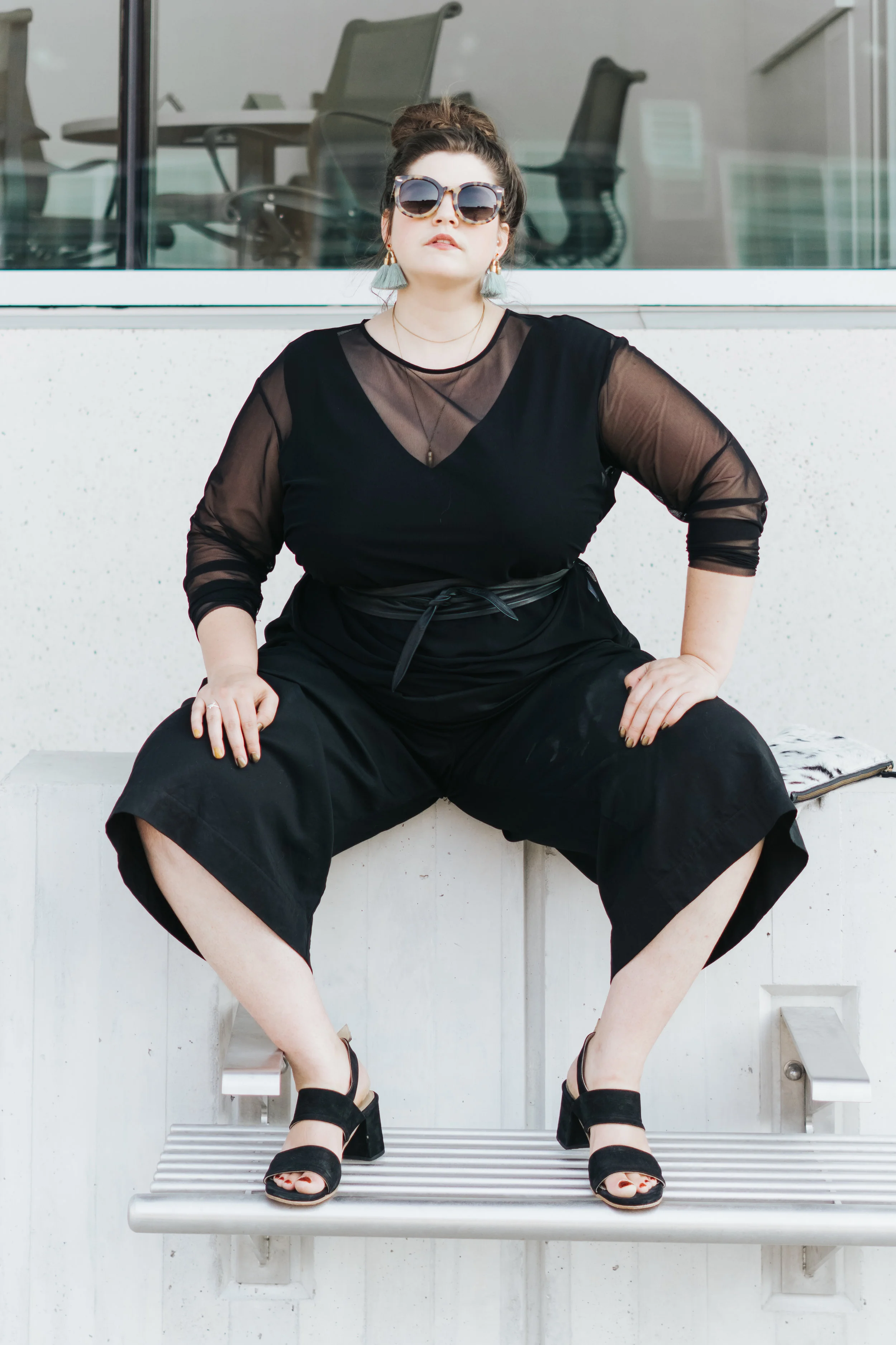 Now this is a power suit. Marielle wears a Hackwith Design Basics jumpsuit, Universal Standard Fog Top , Poppy Barley heels, and Ora-C earrings.