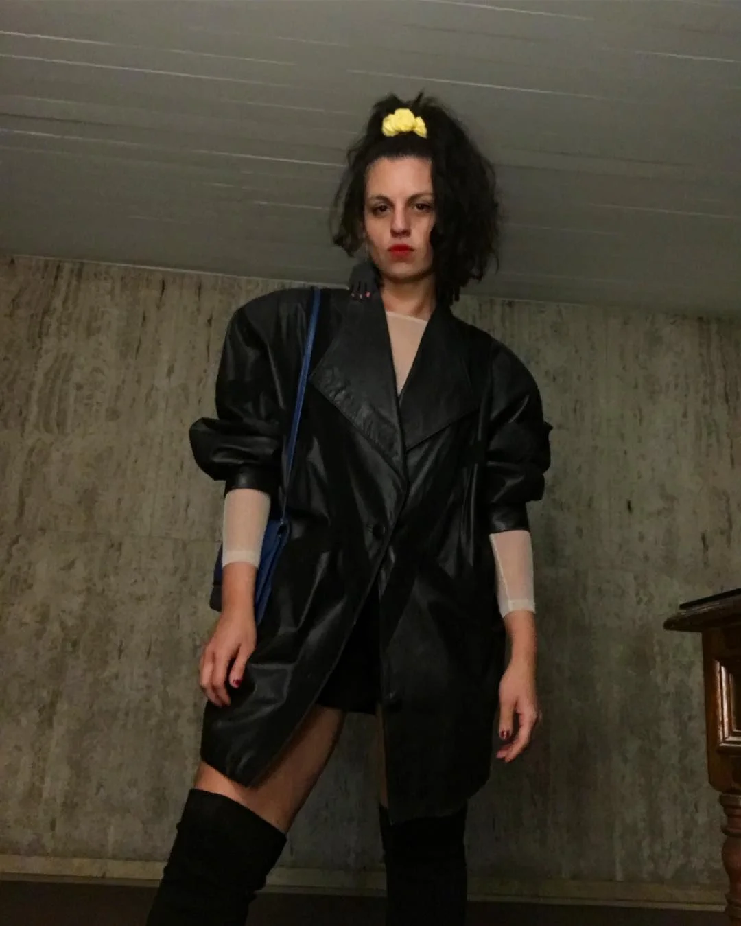 Put me in, coach. Vintage leather coat and earrings by Brazilian brand Pala .