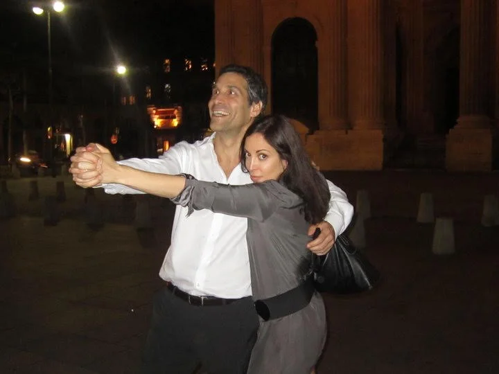 Chere with her husband dancing tago in Paris. She wears a dress by ba&sh .