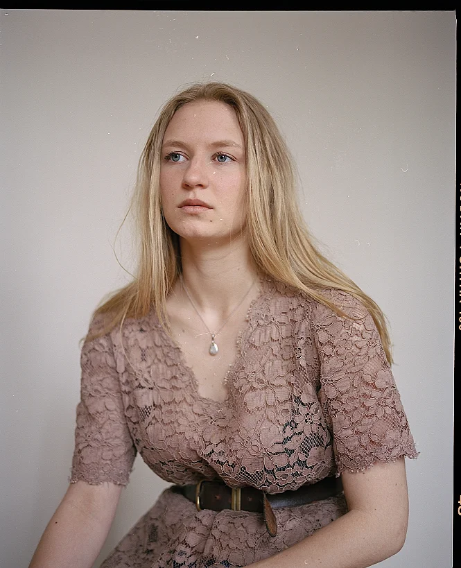 Headshots of Alina Weckström