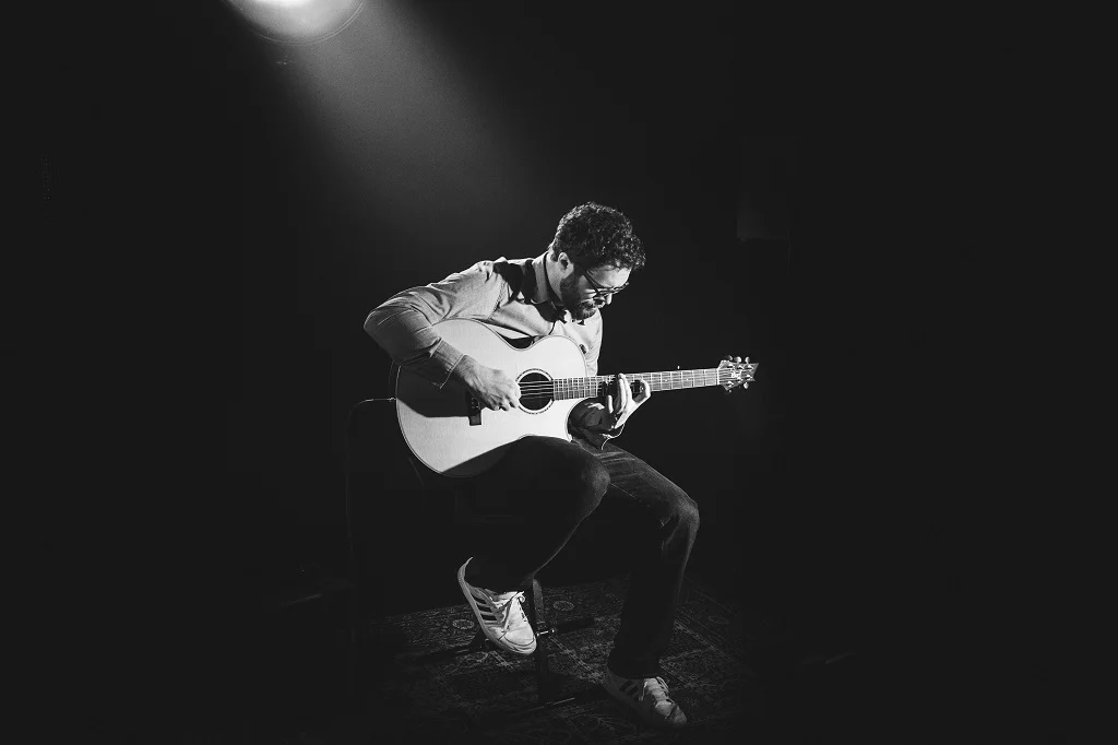 Man playing the guitar.jpg