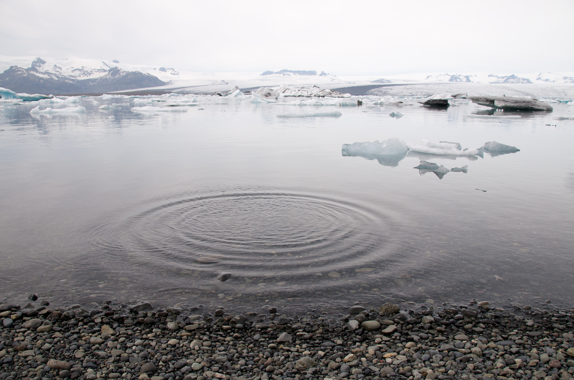 Vanishing Landcape is a collection of photographs taken at the foot of Vatnajökull, Iceland where the glacial ice breaks off into an expanding lagoon and drifts into the sea. The photographs of melting ice highlight the concrete and tangible effects