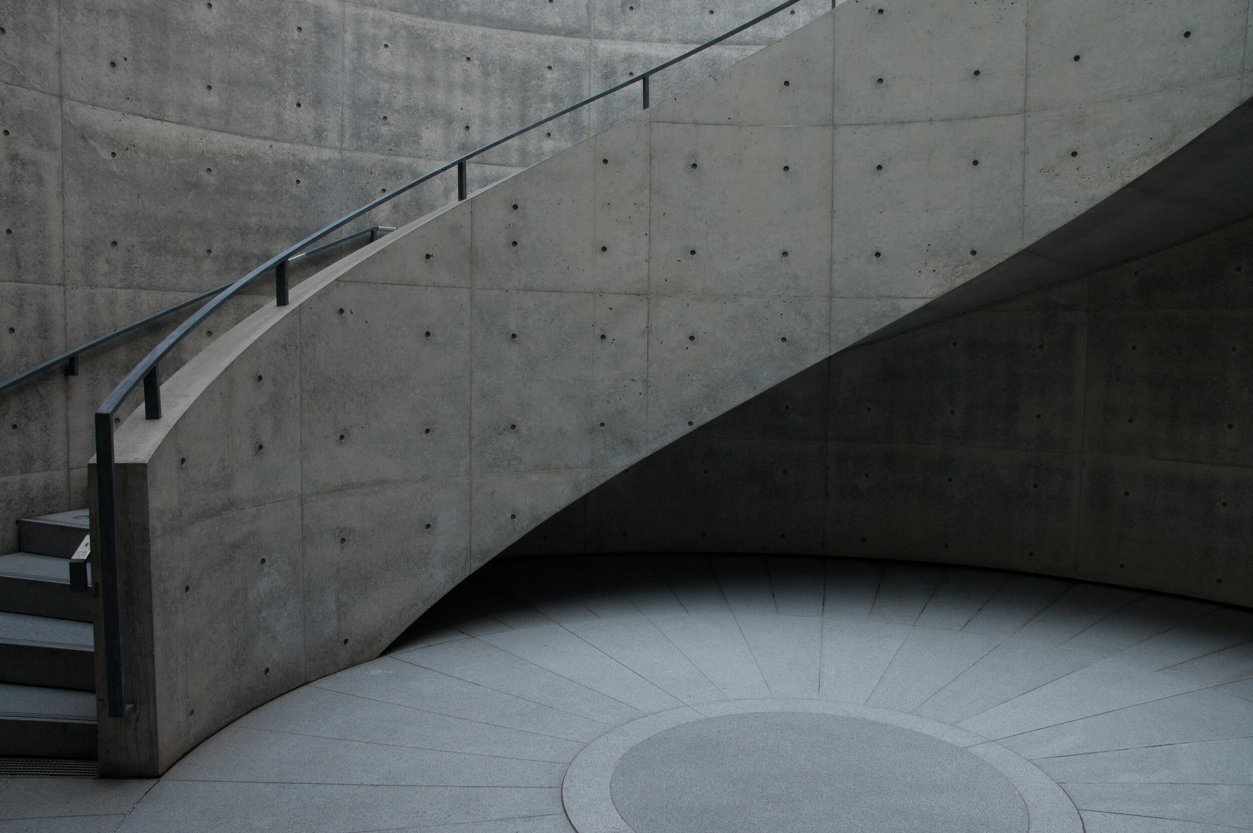  This series of photos were taken in Japan in 2006-2007, on my pilgrimage to view and document the architecture of Tadao Ando. I fell in love with the majestic structures, the concrete, curves and the play between light and shadow of his buildings. 