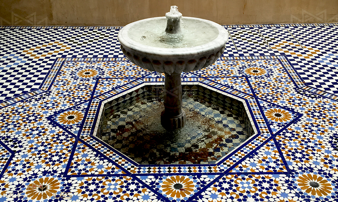 Moroccan traditionnal handmade zellige and foutain patio