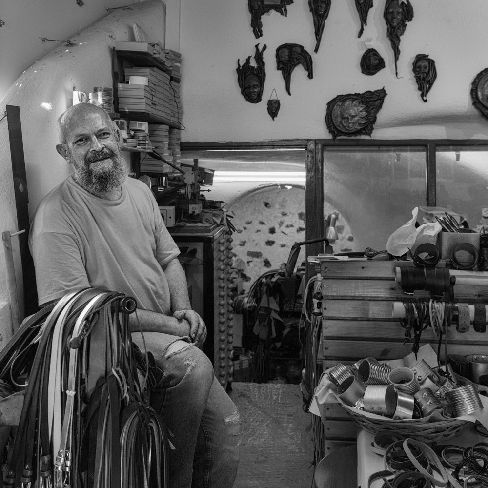 Master leather craftsman in his workshop, Santorini, Greece