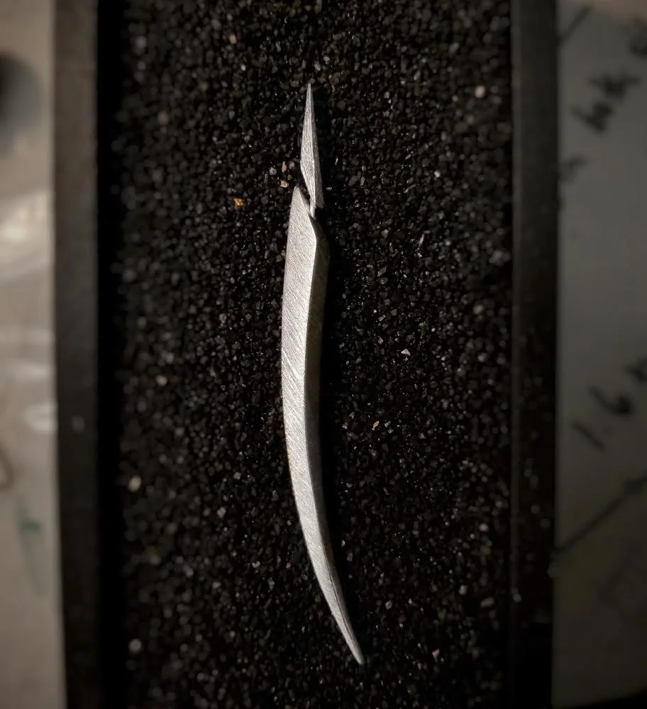 “Tusk Earring” sterling silver