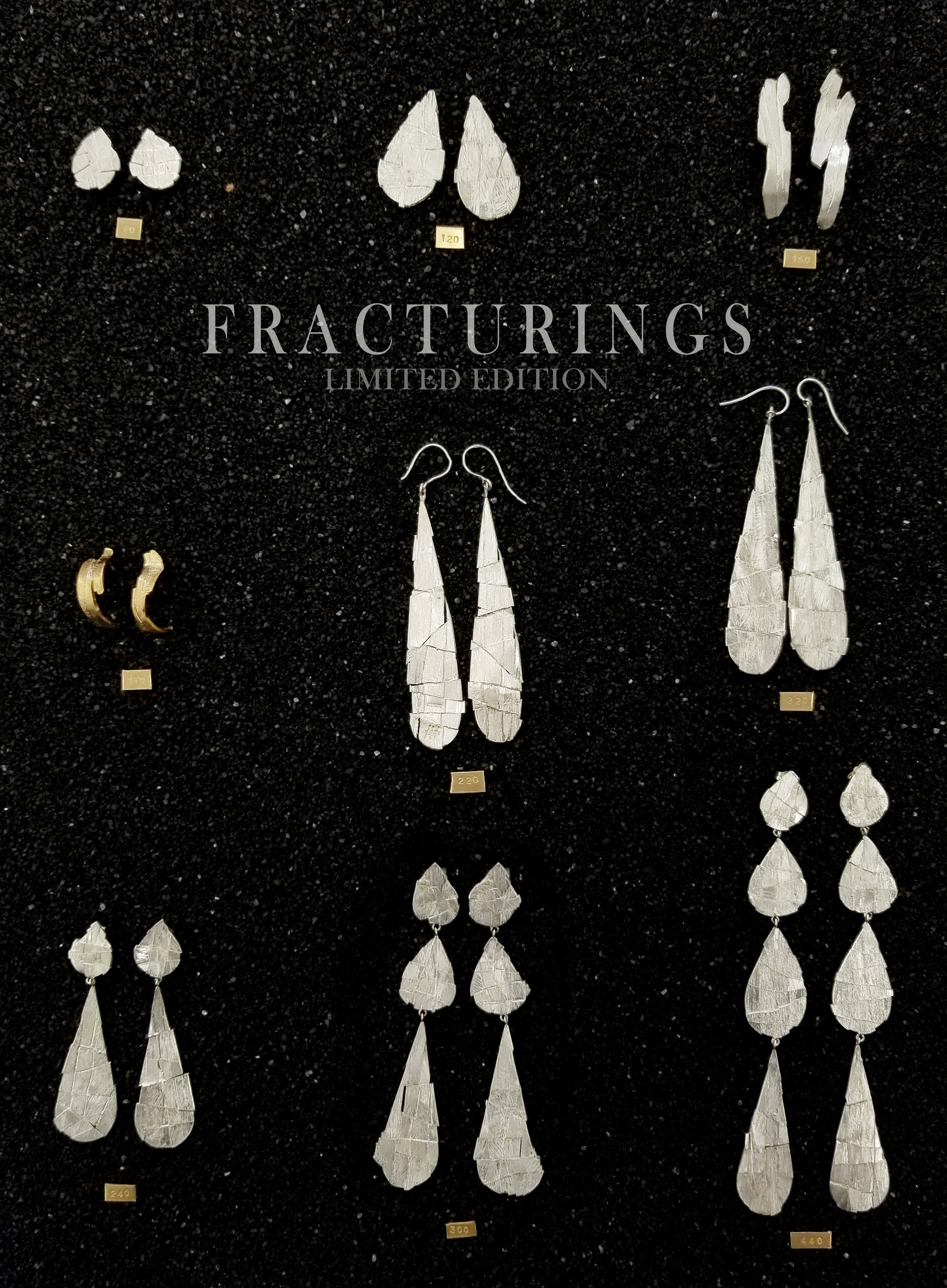  An exploration of texture and reflectivity,  FRACTURINGS  comprises an array of earrings that have been shattered apart and re-unified to reflect light like the facets of stones. 