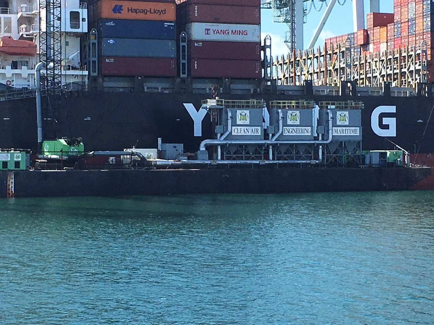 A cargo ship docked in the Port, powered by Alternative Maritime Power.