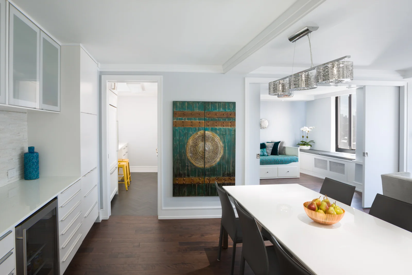 A peak into the living room, dining room, kitchen and the multipurpose room from the foyer. We love the open layout of the house and the flow it creates from one space to the other... there is clear definintion of space alongside open floorplan to keep everyone connected. 
