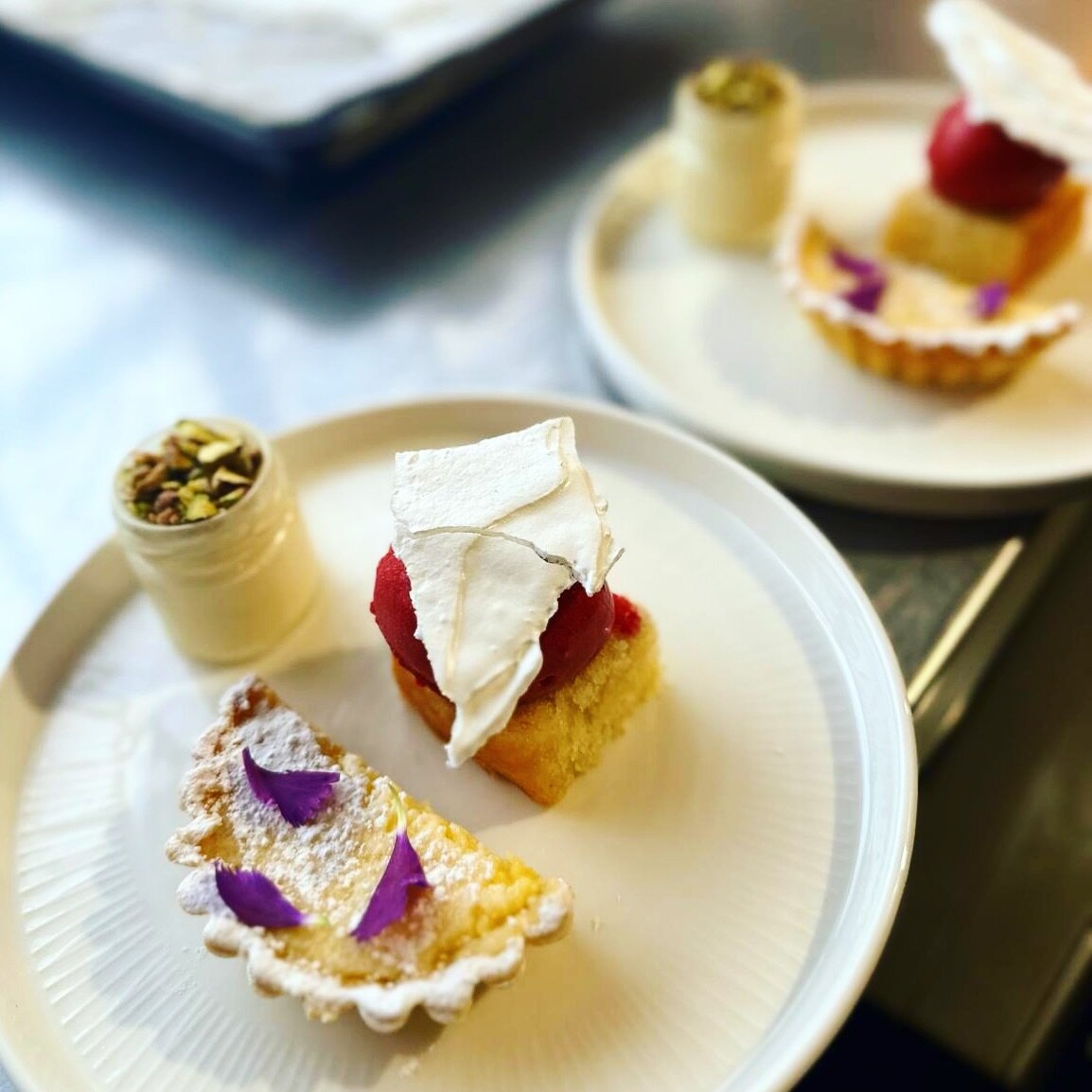 Still our most popular dessert * Taste Lemon, glazed lemon tart, citrus posset &amp; crushed pistachios, Lemon &amp; pistachio drizzle cake, raspberry sorbet &amp; citrus meringue crisp * A perfect way to end any wedding breakfast! #rosettescatering 