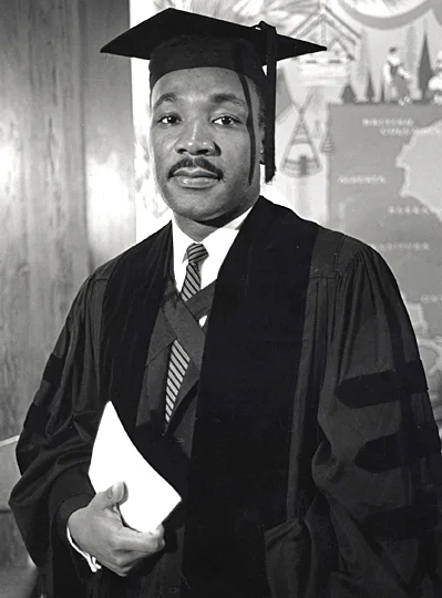 Martin Luther King Jr. graduates with a B.D. degree.jpg